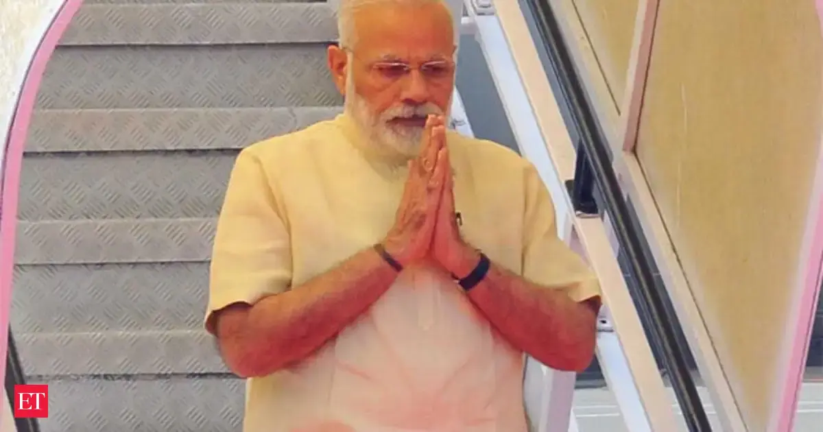 Narendra Modi: Modi begins Indonesia visit by laying wreath at military ...