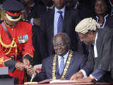 Signing the new constitution into law