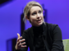Theranos founder Holmes, ex-president charged with fraud