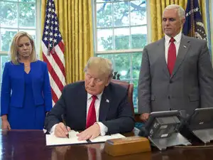 Image result for Trump signs order halting separation of families