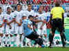 Uruguay beat 10-man Russia 3-0 to top Group A