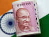 Rupee breaches 69 a dollar mark on NDF play, say dealers