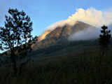 Thick smoke spewing from the summit of Mount Sinabung