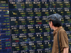 Nikkei rises to 1-month high on weak yen; machinery stocks fall on China concerns