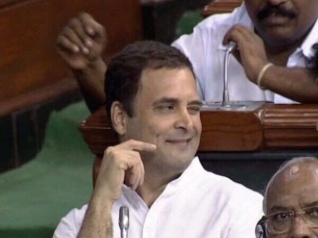 Image result for Rahul Gandhi winks after hugging PM Modi during No-Confidence Vote Debate