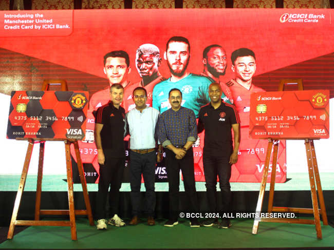 (From left) Manchester United- ICICI Bank cobranded credit cards being unveiled at an exclusive match screening event by Denis Irwin, former Manchester United player, Sudipta Roy, general manager, ICICI Bank, Anup Bagchi, ED, ICICI Bank, and Quinton Fortune, former Manchester United player