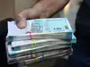 Rupee opens 10 paise up at 71.65 against dollar