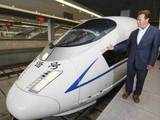 Arnold Schwarzenegger inspects a China's high-speed train