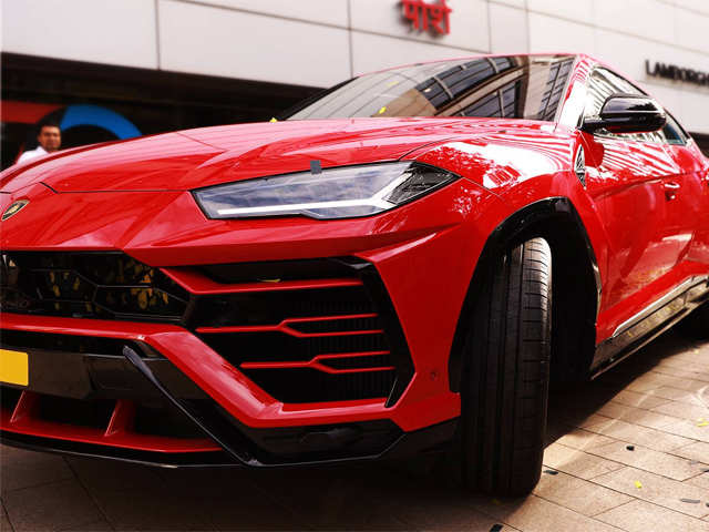 Rosso Anteros shade of red - Urus, Lamborghini's first super SUV just sold  for above Rs 3 crore in India | The Economic Times