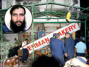 Aftermath of the GB blast (above) and IM founder Bhatkal (inset)