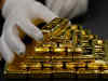 Gold prices hit over 1-week high on soft dollar, Italy woes