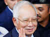 Former Malaysian PM Najib Razak, ex-treasury chief charged with criminal breach of trust