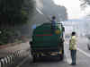 DFS sprinkles water on trees in central Delhi to check pollution