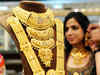 Gold loses sheen in Diwali trade, prices fall Rs 210