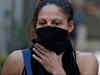 Women boxers wear masks, scarves to beat smog at world championship in India