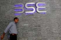 A man walks out of the Bombay Stock Exchange (BSE) building in Mumbai