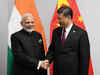 PM Narendra Modi meets Chinese President Xi Jinping , discusses ways to strengthen bilateral ties