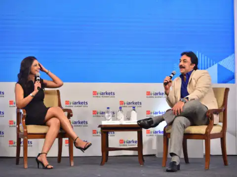 A lighter vein: ETNow's Ayesha Faridi and First Global's Shankar Sharma hit the ground running