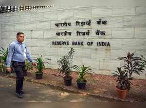 Mumbai: A man walks past near the Reserve Bank of India Headquarters, in Mumbai....