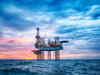 Oil prices slide on swelling US supply, global market slump