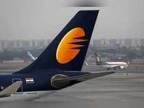 FILE PHOTO: A Jet Airways plane is parked on the runway at the Chhatrapati Shivaji International airport in Mumbai, India