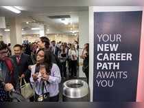 FILE PHOTO: Job seekers and recruiters gather at TechFair in Los Angeles