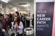 FILE PHOTO: Job seekers and recruiters gather at TechFair in Los Angeles