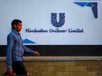 FILE PHOTO - A pedestrian walks past the Hindustan Unilever Limited (HUL) headquarters in Mumbai