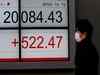 Nikkei ends higher on financials; Sony, Honda results a dampener
