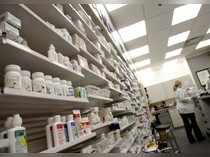 A pharmacist works at a pharmacy in Toronto