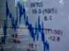 Nikkei snaps 4 days of gains on US data; trade talks limit losses