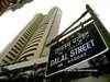 Sensex drops 27 points, Nifty inches up to end at 10,792