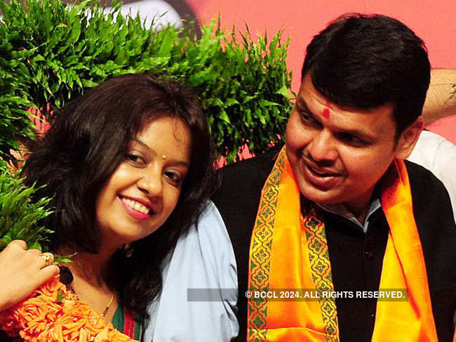 Devendra Fadnavis and wife Amruta (L)