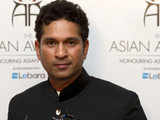 Sachin Tendulkar poses after winning Asian Awards