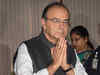 Arun Jaitley promises to lower rate, broaden tax base