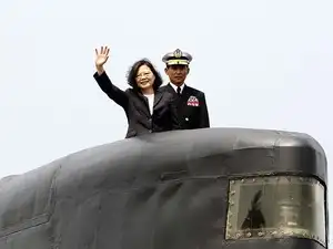 China says Taiwan moves like 'stretching arm to block a car'