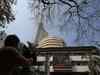 Sensex, Nifty settle flat as investors take profit