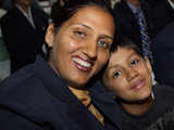 Discus thrower Krishna Poonia with her son during felicitation ceremony