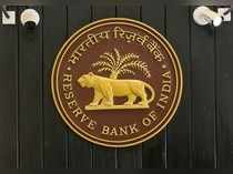 CCTV cameras are seen installed above the logo of Reserve Bank of India (RBI) inside its headquarters in Mumbai