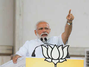 Modi accuses Cong of election scam, looting money of poor