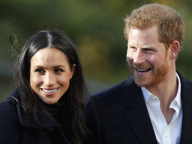 Duke and Duchess of Sussex, Prince Harry and Meghan Markle (L)