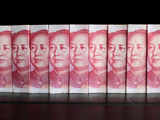 China's central bank won't let yuan weaken past 7 to the dollar