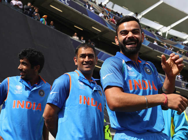 The next game, played by  Virat ​Kohli (R), MS Dhoni (C) & Jasprit Bumrah​ (L), is against defending champions Australia, that will be played at The Oval in London.​