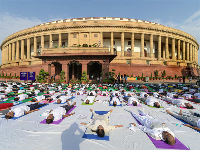 Parliamentarians perform Yoga