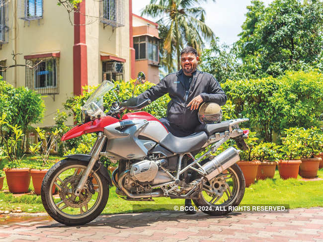 ​​For an awards night, Riyaaz Amlani​ would arrive in  his BMW GS1200.
