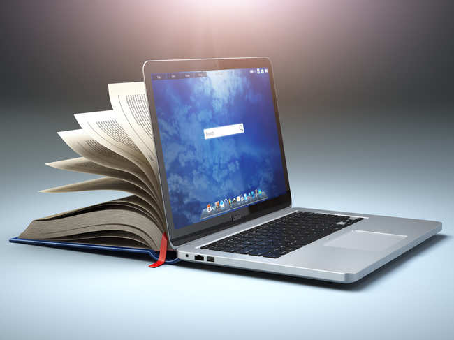 laptop-book-study-GettyImag