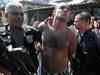 Police take control of Rio de Janeiro slum, nab drug lord