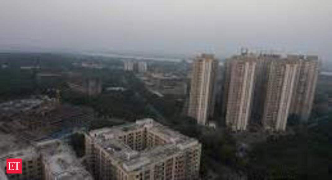 Unitech asked to clear Rs 2,734 crore dues in 15 days or lose Noida land - Economic Times