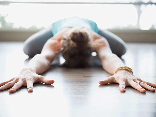 stretching-arms-yoga_640x480_getty