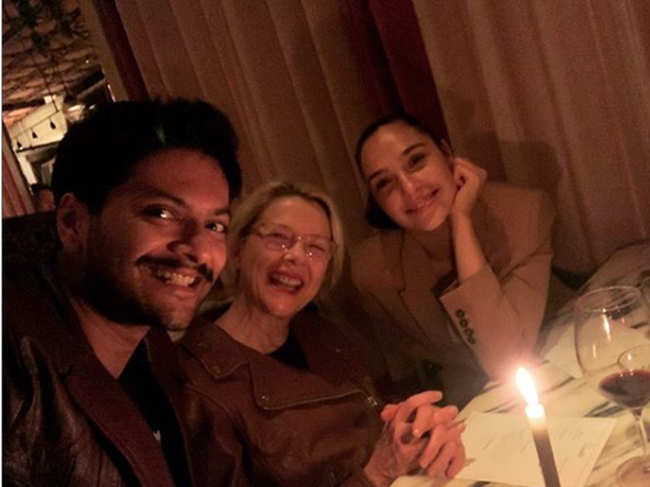 ​Ali Fazal with co-stars Gal Gadot and Annette Bening at dinner.​